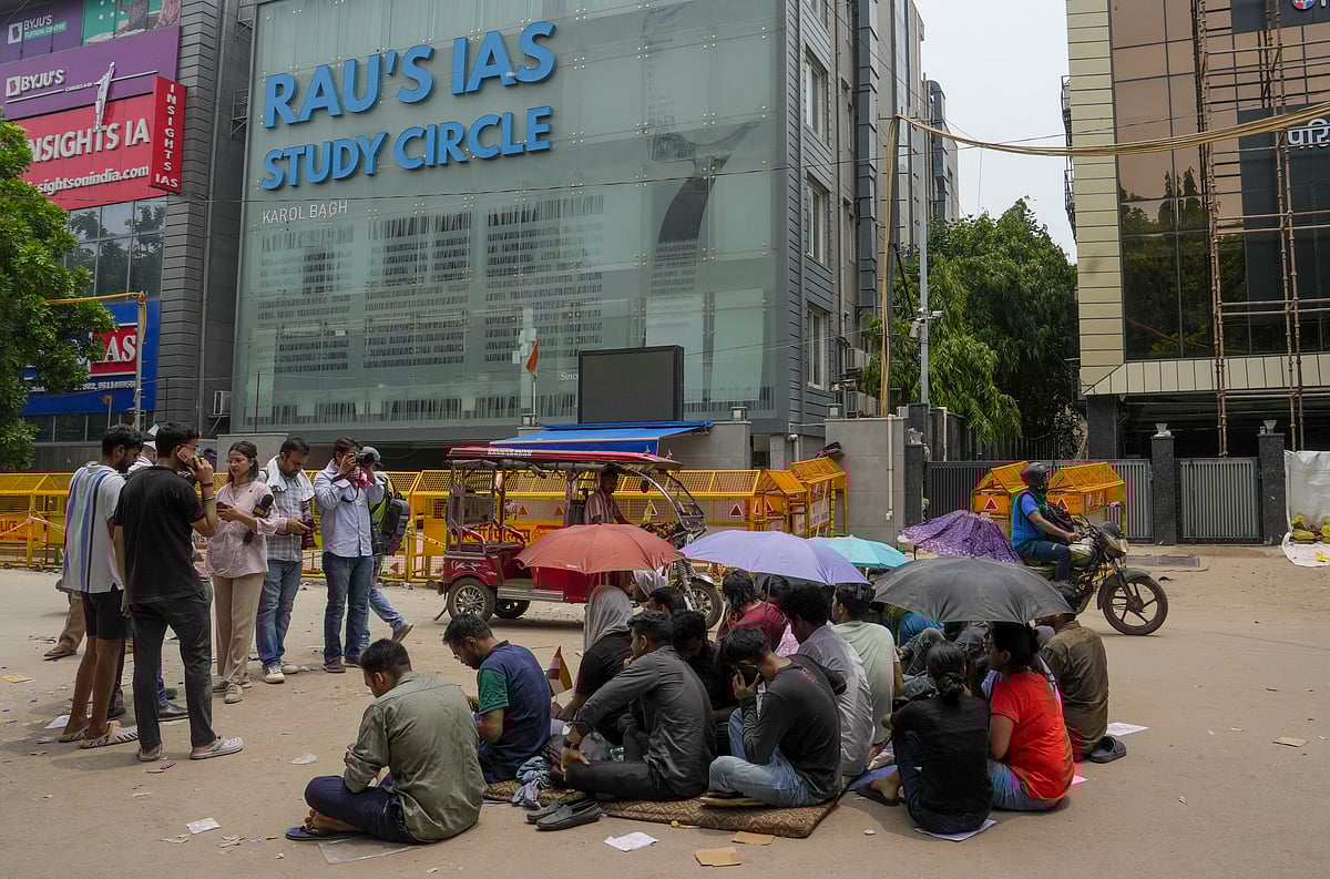 PTI : Students stage a protest after three civil services aspirants died due to drowning at a coaching centre in Old Rajinder Nagar area, in New Delhi